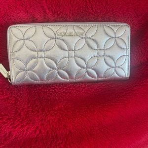 Michael Kors continental wallet.